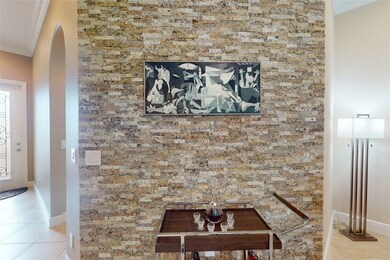 Custom lux stone feature wall defines kitchen and