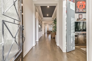 Step inside to a bright and welcoming entryway fea