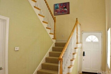 High ceiling stairway.