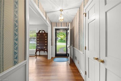 ...reflecting sample trimwork, solid doors, hardwood floors.
