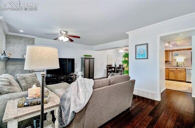 Main level cozy living room with gas fireplace