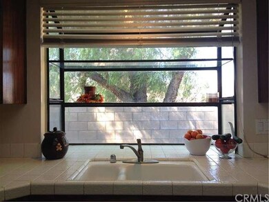 2 compartment sink, nice view of the outside