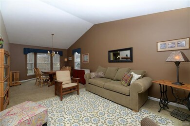 Livingroom and dining room have vaulted ceilings.