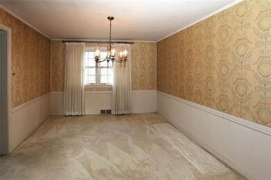 Dining Room open to Living Room with hardwoods und