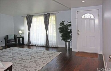 Entry Door Opens to Formal Living Room
