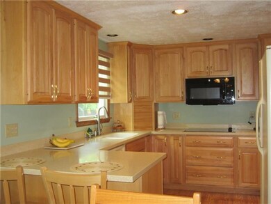 Newer kitchen with corian counter tops with newer 