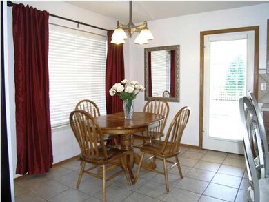 THE FORMAL DINING FEATURES AN EASY-CARE TILE FLOOR
