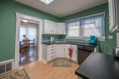 Kitchen features walk-out