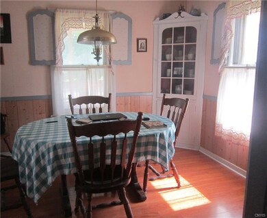 Dining room with nice built in corner cabinet
