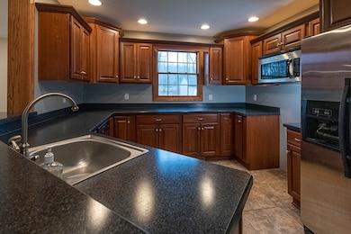 Kitchen has ample cabinets
