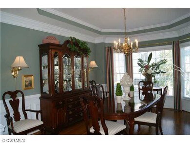Dining Room - Formal dining room has a tray ceilin