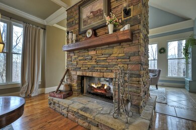 Main level family room 2-sided fireplace
