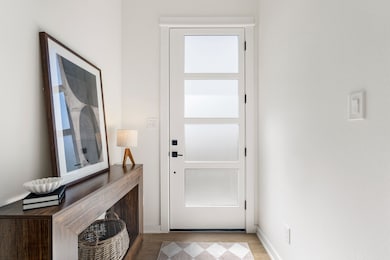 Step inside to a bright and welcoming entryway.