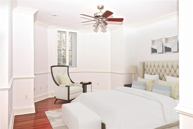 Virtually staged master bed.