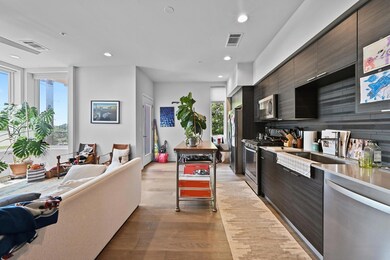 Kitchen with modern cabinets, light wood-style fl