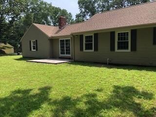 BACK EXTERIOR SHOWING PATIO
