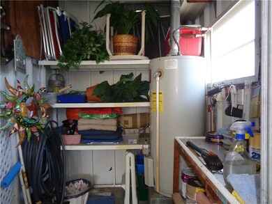 Inside the Storage Shed * Note Gas Hot Water Heater * Washer/Dryer is Allowed