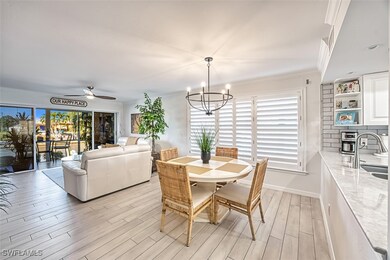Dining space with sink, a healthy amount of sunlig