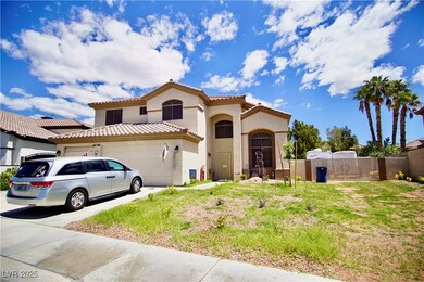 Mediterranean / spanish home featuring fence, a ti