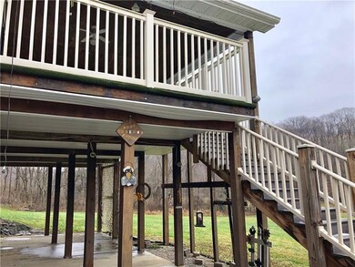 Steps lead to Front Door.  Nice Patio underneath t
