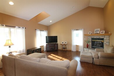 Open layout, gas fireplace, sky lights, hardwood f