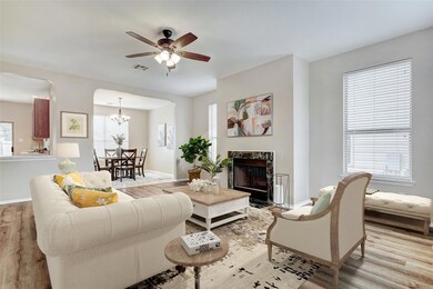Living area with wood finished floors, healthy am