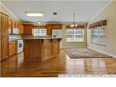 View of kitchen with Louisiana Cypress cabinets, s