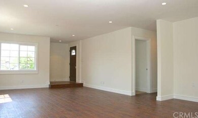 Bright and open living spaces with hardwood floors