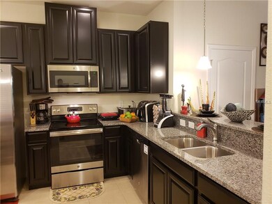 Beautiful upgraded kitchen with granite, stainless