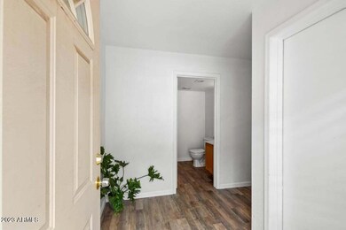Entry + downstairs Bathroom