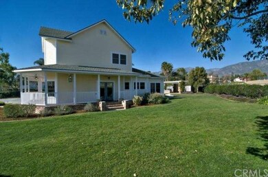 Side of Main House with Porch and French Glass Doo