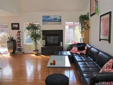 Large living room with new fireplace and cathedral