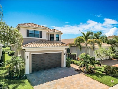 Mediterranean / spanish-style home with a garage