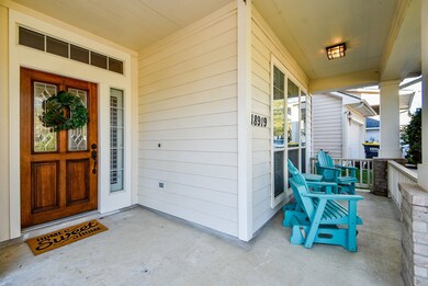 Welcome home!  Come sit on this great porch and visit with your neighbors.