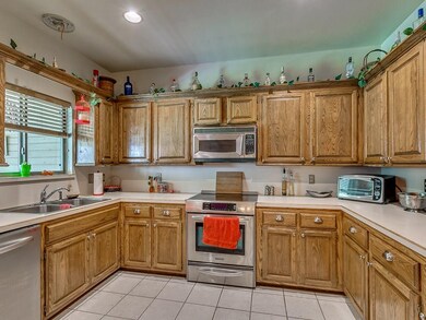 Lots of cabinet and counter top space in this kitc