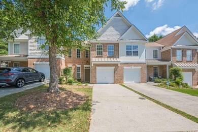 Charming Brick front townhome with classic curb appeal.