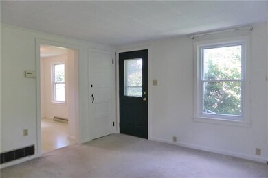Living Room w/ Wall to Wall Carpet