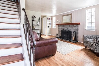 Beautiful hardwood floors and fireplace in Living 