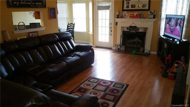 LIVINGROOM AND MARBLE FIREPLACE