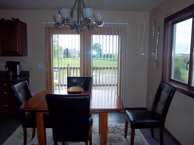 Dining Area With French Door to Deck
