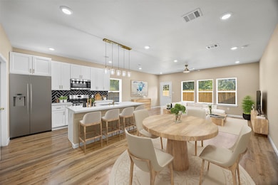 This spacious dining area is thoughtfully positioned to flow seamlessly with the kitchen, allowing you to cook, gather, and entertain with ease — all while staying connected to the heart of the home. **Virtually staged**
