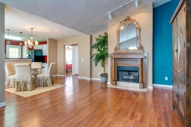 Open layout and hardwoods throughout