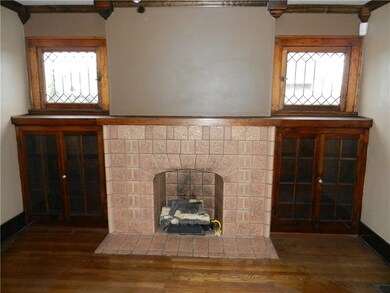 Living room fireplace and built-ins.
