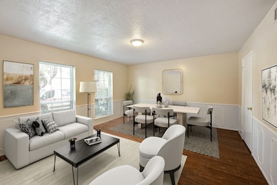 Virtually staged. Living room/dining or however yo