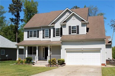 The gray vinyl siding and black shutters are truly