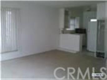 Livingroom towards kitchen