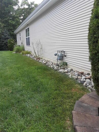 River Rock replacing need to mulch along sides of 