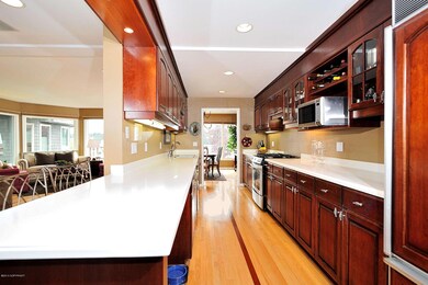 Custom Cherry Cabinetry w/Contrast Tops