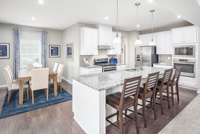 private dining area off the kitchen area!  *Photos of a current Model*