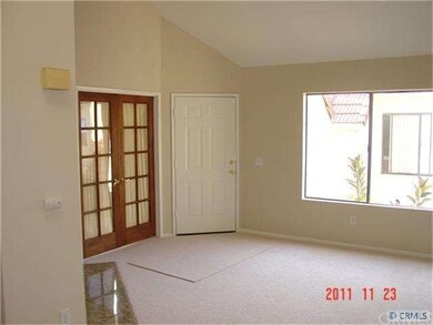 Living room looking to entry
